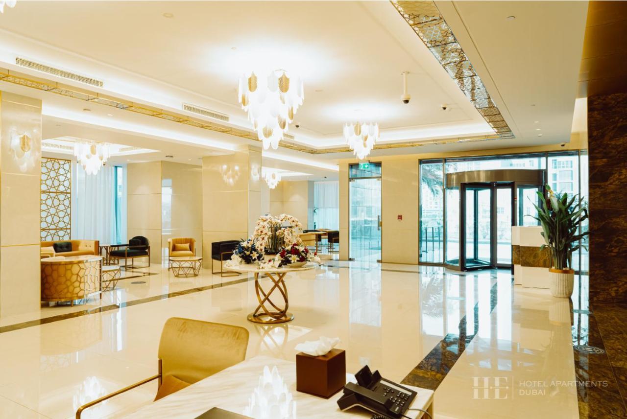 HE Hotel Apartments Dubai Exterior foto Lobby